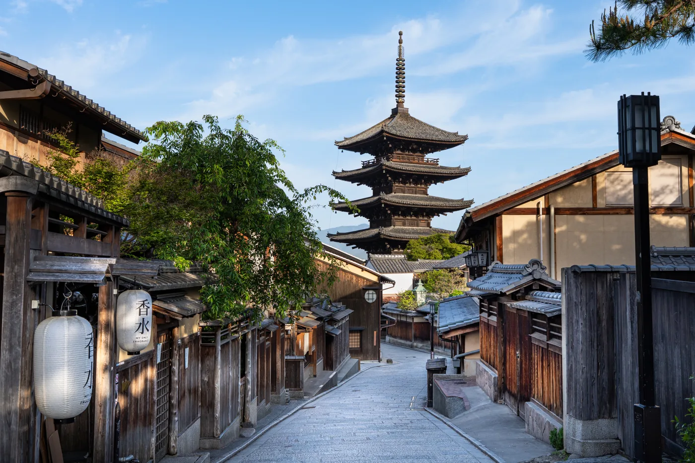 A quiet preserved street in Kyoto's Higashiyama district with Yasaka Pagoda