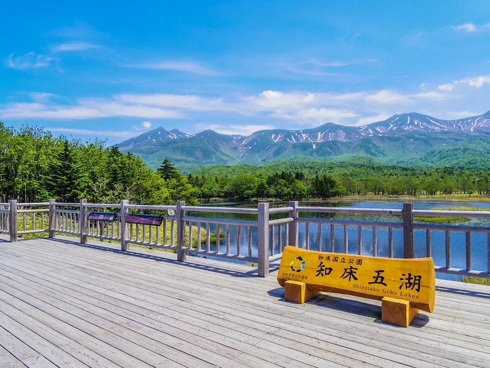A wooden viewing deck beside a lake in the Shiretoko Goko area