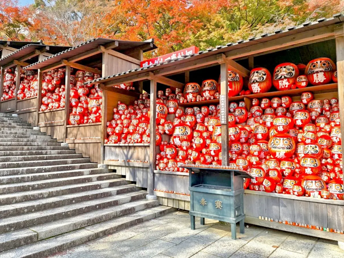 Rows of red daruma dolls at Katsuoji Temple