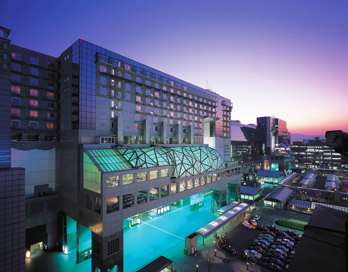 Hotel Granvia Kyoto above the station forecourt at dusk