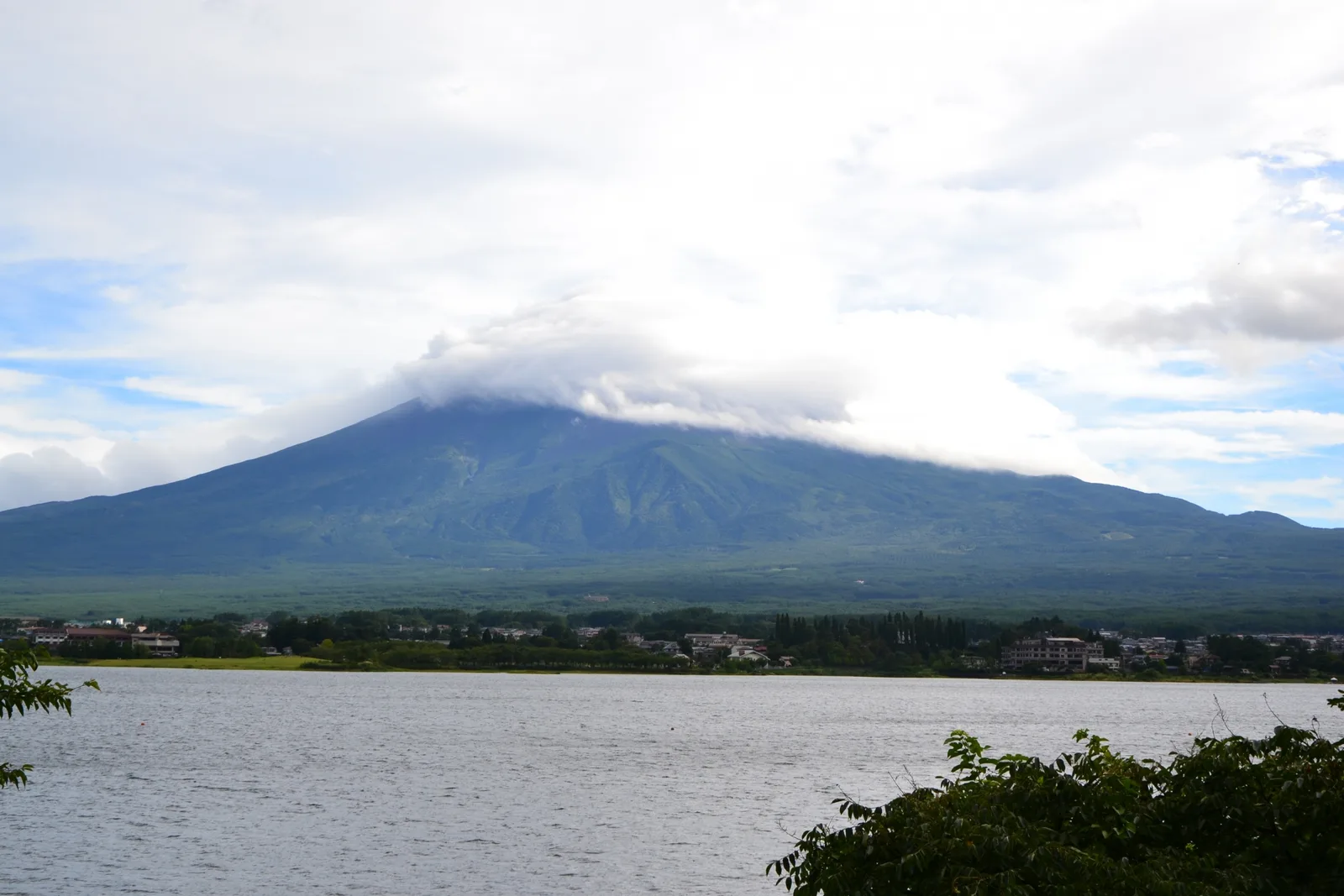 Cloud covering the summit of Mount Fuji above Lake Kawaguchiko