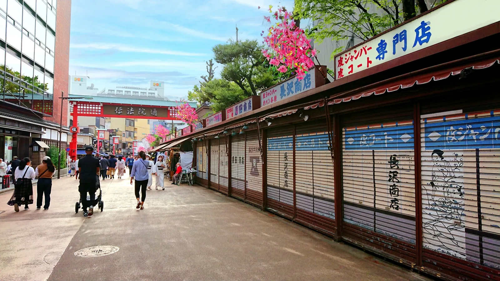 Painted shop shutters along Denboin Street in Asakusa
