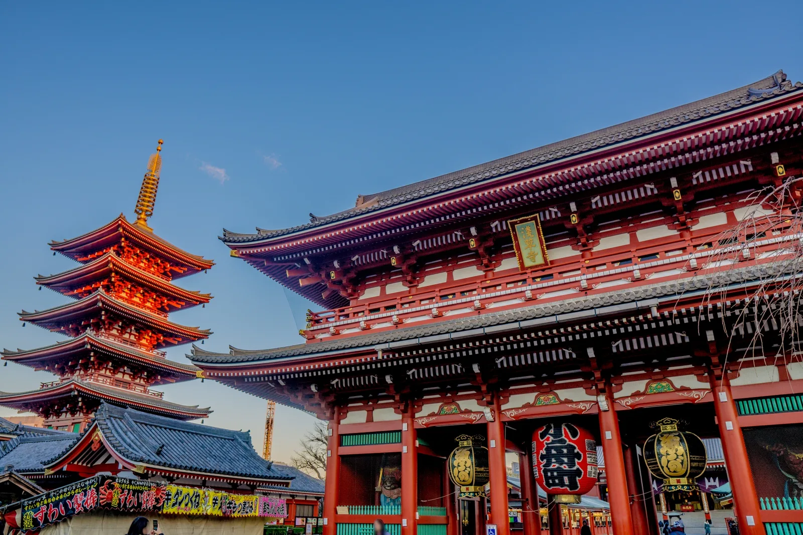 Sensoji main hall and five-story pagoda beneath a clear blue sky