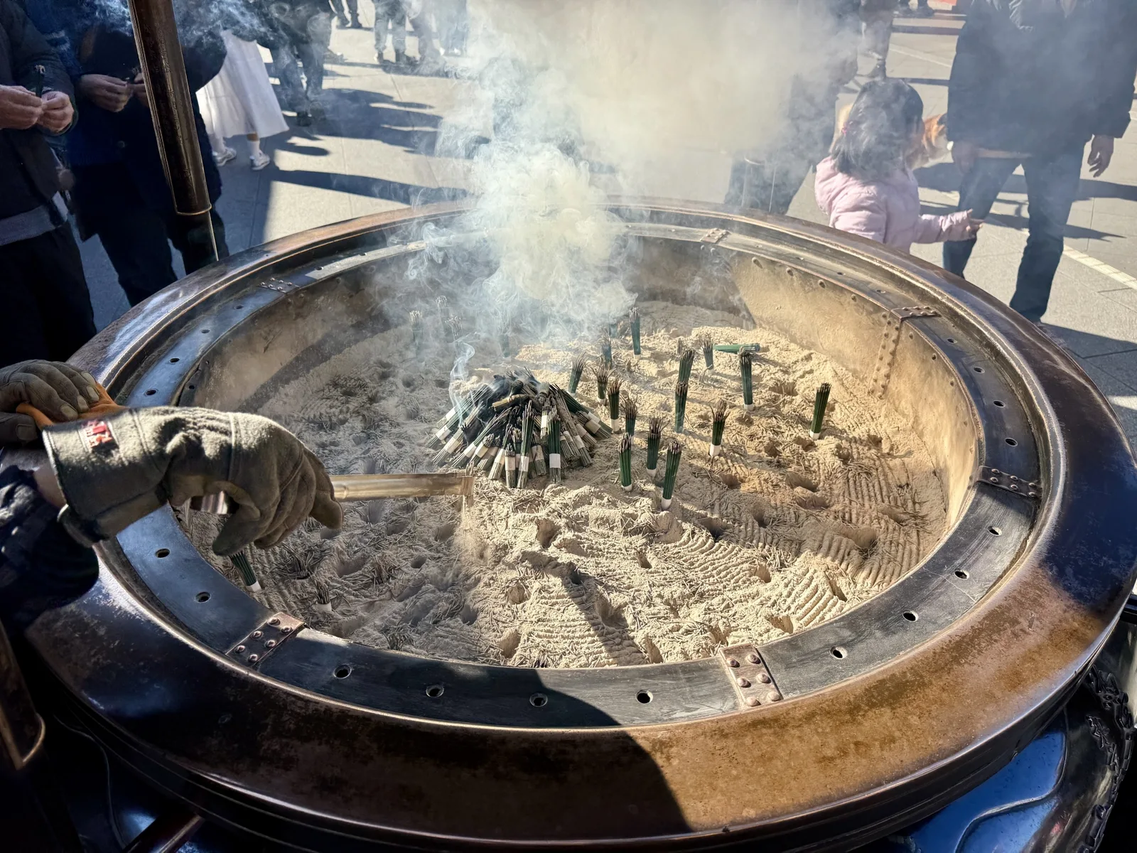Incense smoke rising from the large burner at Sensoji