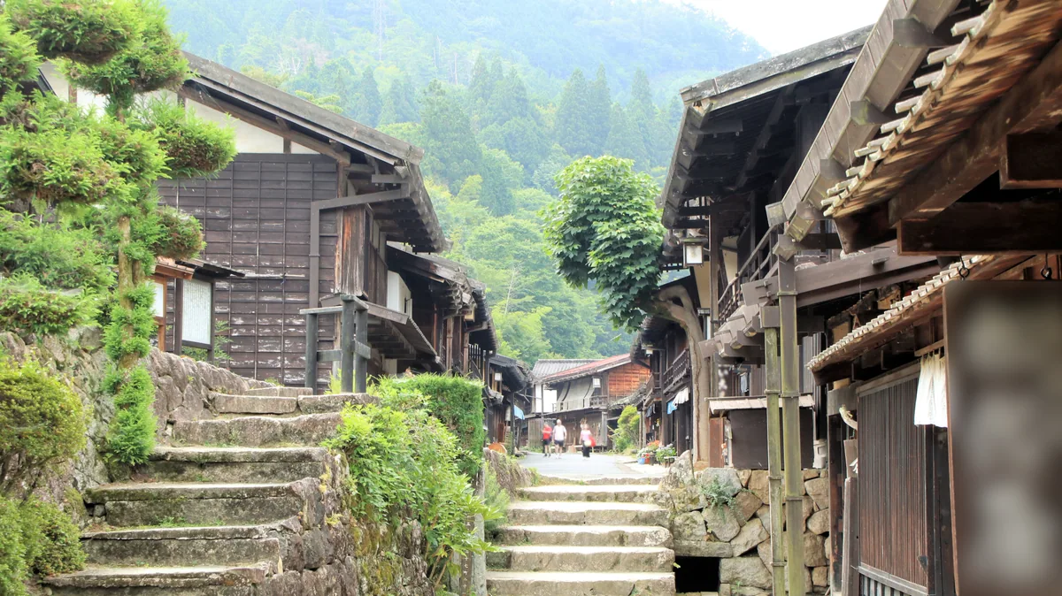 Stone steps between wooden houses near the Masugata area of Tsumago
