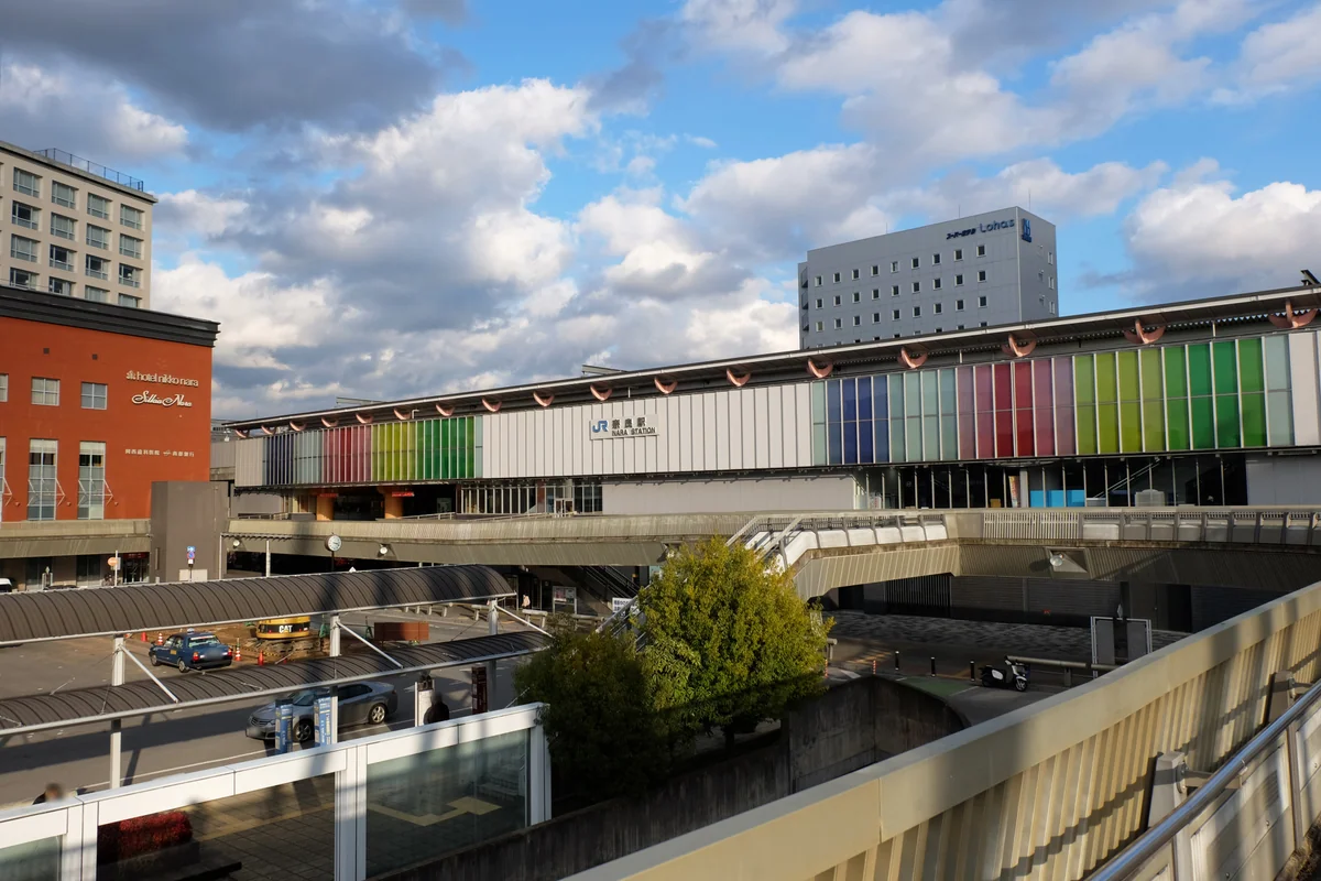 The exterior of JR Nara Station above its station approach