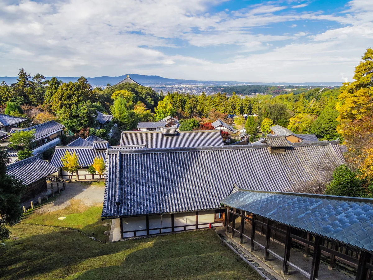 The view from Nigatsu-do over temple roofs toward the Nara cityscape