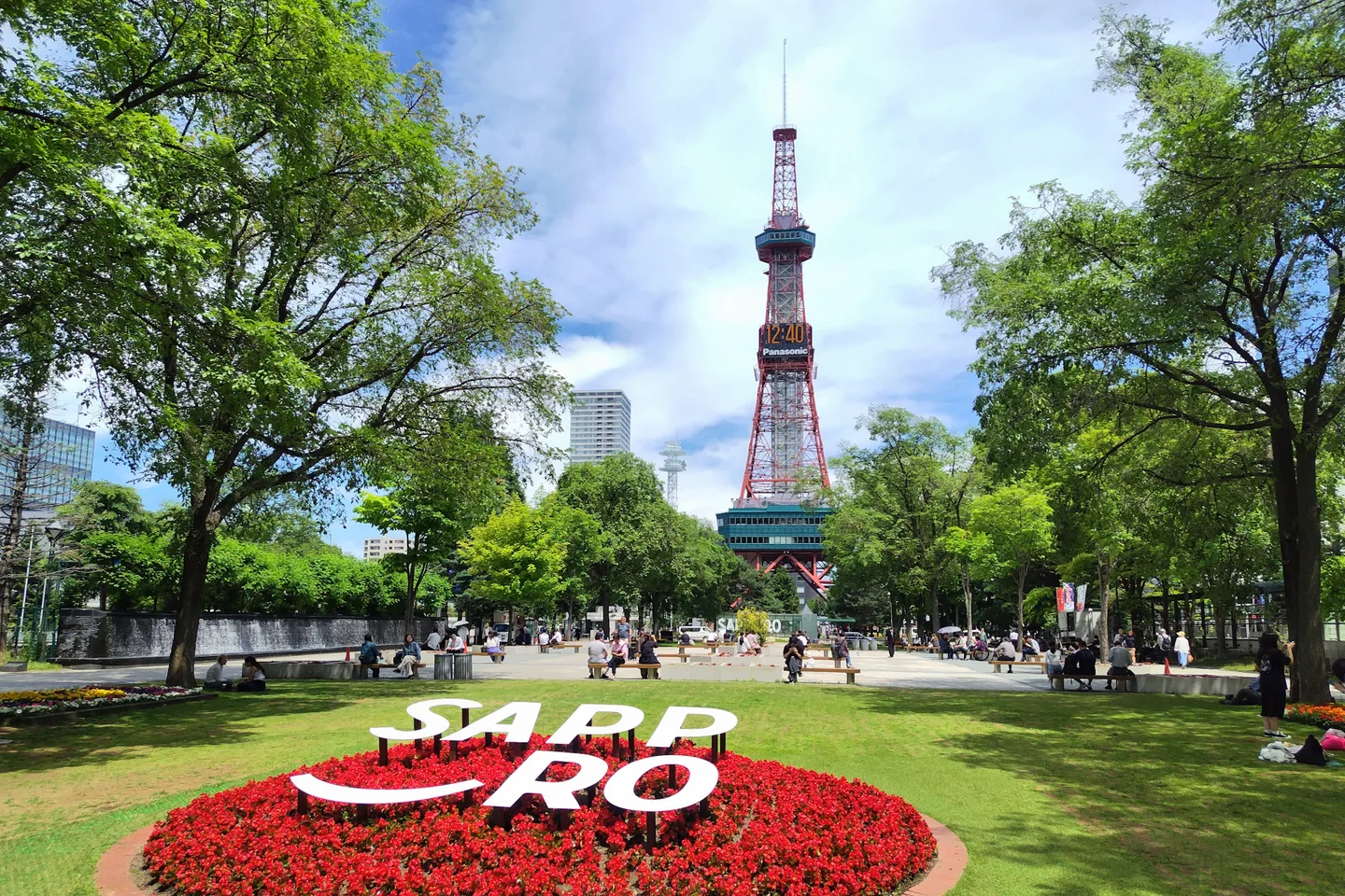 Sapporo TV Tower beyond the lawns and flower beds of Odori Park
